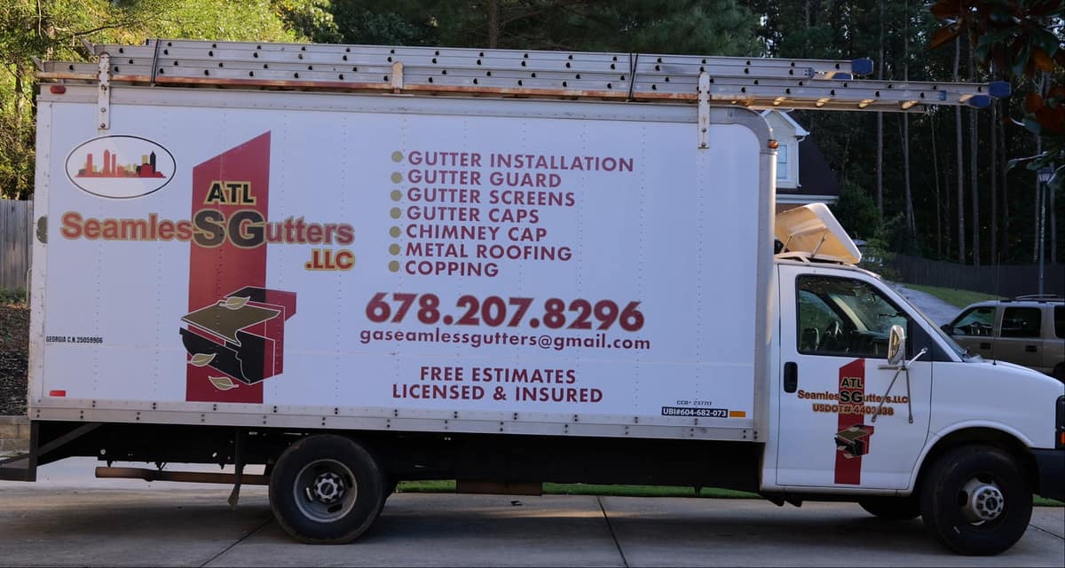 ATL Seamless Gutters work truck parked outside an Atlanta home
