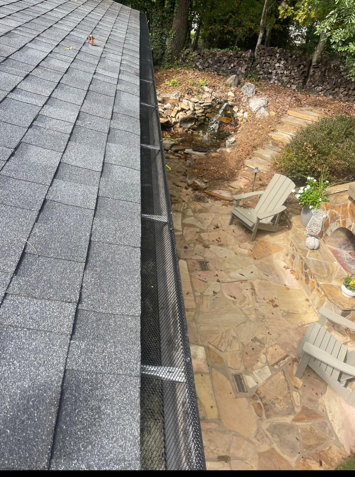 Underground drain line carrying downspout water away from a foundation